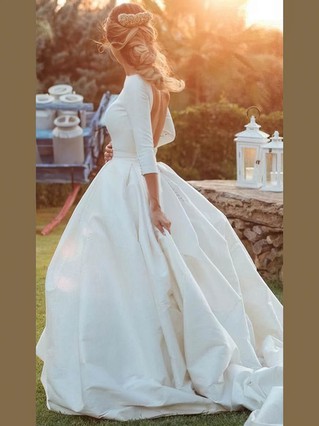 Three-quarter sleeves wedding dress